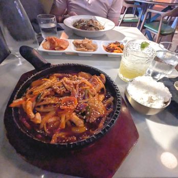 929 Kitchen & Bar - Spicy Squid and Pork Belly (OSAM Bulgogi) (front) Pineapple Fuego mocktail, Banchan, Japchae (top/back) - Korean Near Me - Columbia, South Carolina 929 Kitchen & Bar - Spicy Squid and Pork Belly (OSAM Bulgogi) (front) Pineapple Fuego mocktail, Banchan, Japchae (top/back) - Korean Near Me - Columbia, South Carolina