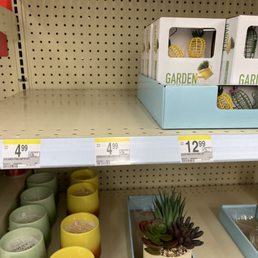 a variety of planters in a store a variety of planters in a store