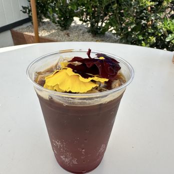 NUDAE Coffee - Blood orange hibiscus espresso tonic with flowers on top! - Coffee & Tea Near Me - Costa Mesa, California NUDAE Coffee - Blood orange hibiscus espresso tonic with flowers on top! - Coffee & Tea Near Me - Costa Mesa, California