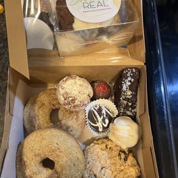 Sweet Real - Boxed items are: donuts, oatmeal raisin cookies, peanut butter bombs, Oreo cookie bomb, red wine brownie. Yum!!! - Bakeries Near Me - Cape Coral, Florida Sweet Real - Boxed items are: donuts, oatmeal raisin cookies, peanut butter bombs, Oreo cookie bomb, red wine brownie. Yum!!! - Bakeries Near Me - Cape Coral, Florida