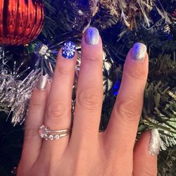 Top Nails - Becky ALWAYS does an amazing job! She creates this little Snowflake for my "winter nails" and it's perfect!!