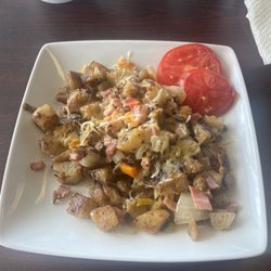 Sweet Cheezus- - Hash browns with vegetables and ham.