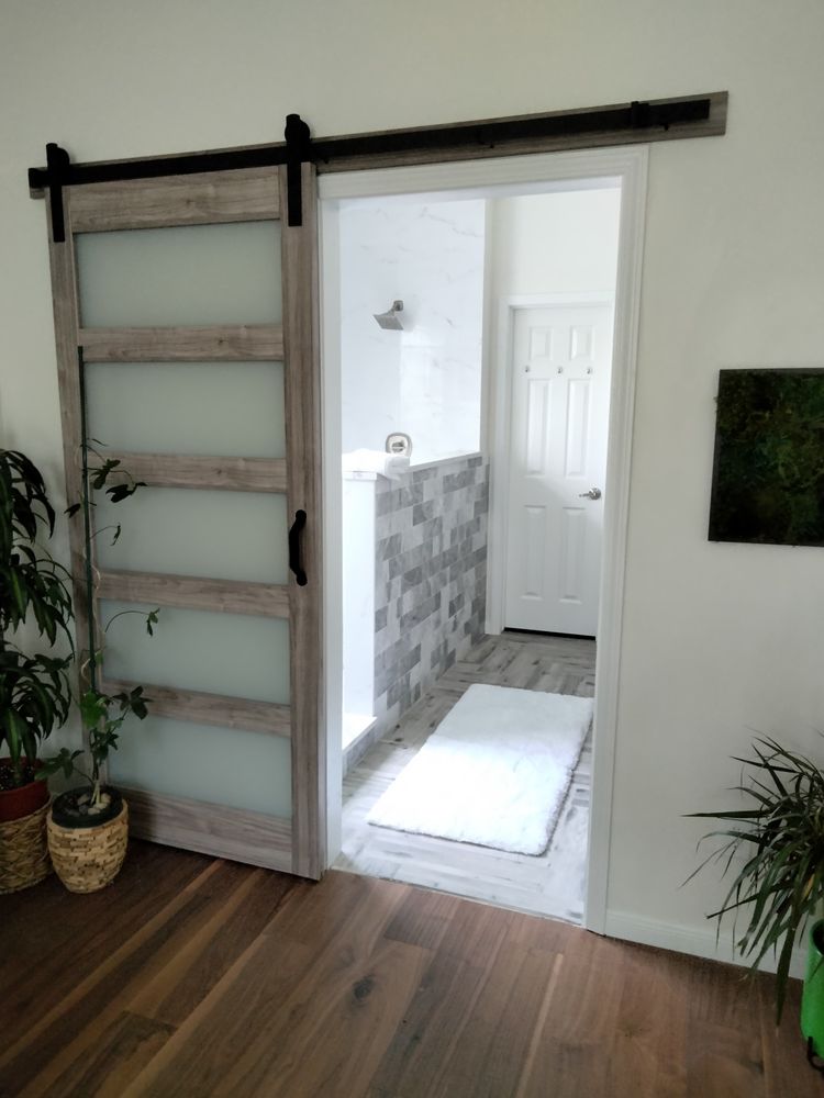 Slide of Hamma Roof & Construction