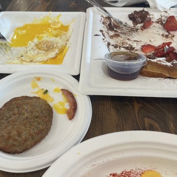 Cafe Destin - Nutella strawberry waffle, eggs, sausage, eggs Benedict - Cafes Near Me - Destin, Florida