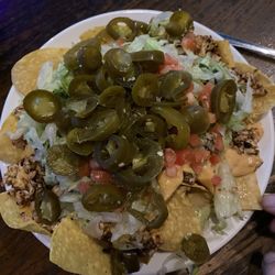 TJ Mulligan's - Nachos a Grande extra jalapeño.