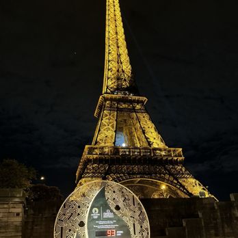 Eiffel Tower, Paris France - Caught the full moon between the tower. - Landmarks & Historical Buildings Near Me - Paris Eiffel Tower, Paris France - Caught the full moon between the tower. - Landmarks & Historical Buildings Near Me - Paris