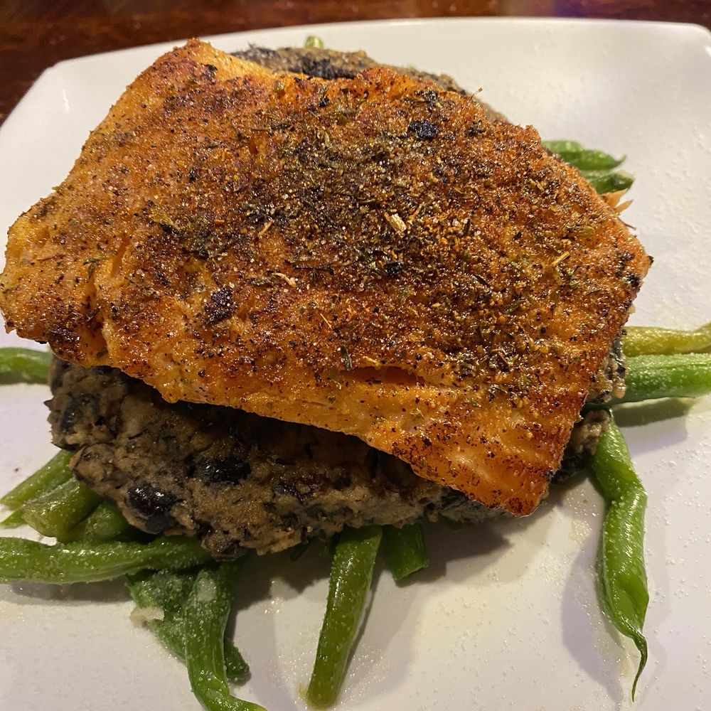 Copper Premium Pub - Delicious blackened Salmon on top of a moist Black Bean Cake and Green Beans. It's ALWAYS delicious and I order this at least once a week! - Pubs Near Me - Clover, South Carolina