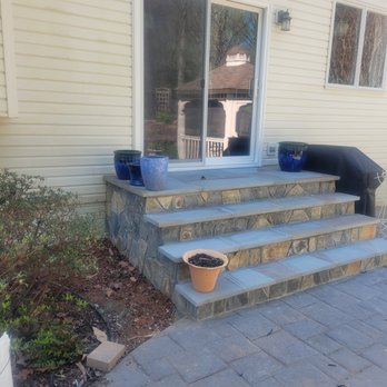 East Coast Landscape Design - New concrete stoop with flagstone on top and fieldstone on the sides. - Landscaping Near Me - Spencerville, Maryland East Coast Landscape Design - New concrete stoop with flagstone on top and fieldstone on the sides. - Landscaping Near Me - Spencerville, Maryland