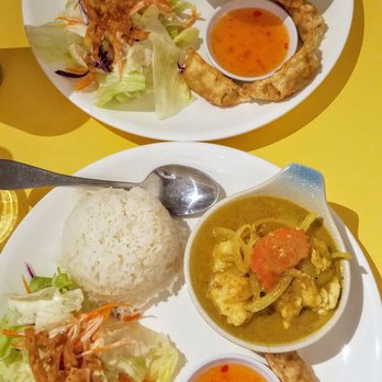 Mine Eathai - Top: Spicy Thai Basil Chicken Special (Medium Spicy) Bottom: Yellow Curry Special (Medium Spicy) - Thai Near Me - Stanton, California Mine Eathai - Top: Spicy Thai Basil Chicken Special (Medium Spicy) Bottom: Yellow Curry Special (Medium Spicy) - Thai Near Me - Stanton, California