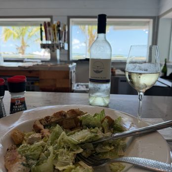 Angler & Ale - Chicken Caesar with glass of wine - Seafood Near Me - Duck Key, Florida Angler & Ale - Chicken Caesar with glass of wine - Seafood Near Me - Duck Key, Florida