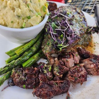 Martyrs - 12oz Ribeye with mashed potatoes & asparagus - Steakhouses Near Me - Taos, New Mexico