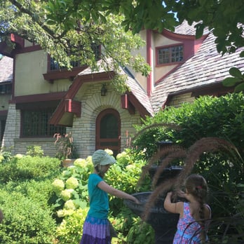 The Grove - Playing in the fountain by the beautiful estate house - Landmarks & Historical Buildings Near Me - Glenview, Illinois