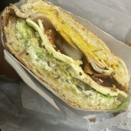 The Deluxe (Giant) Turkey avacado bacon cheese onions pickles lettuce tomato The Deluxe (Giant) Turkey avacado bacon cheese onions pickles lettuce tomato
