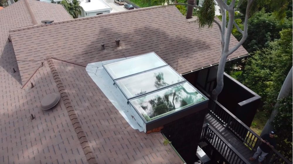 Slide of Honey Badger Roofing