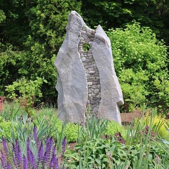 A Bonadio & Sons - a stone sculpture in a garden - Landscaping Near Me - Waltham, Massachusetts A Bonadio & Sons - a stone sculpture in a garden - Landscaping Near Me - Waltham, Massachusetts