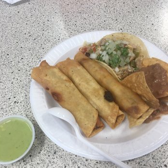Tacos Michoacan - Chatsworth - Chicken Taquitos (#45 on the menu) and a chicken taco. None of that lettuce nonsense on the plate. - Mexican Near Me - Chatsworth, California Tacos Michoacan - Chatsworth - Chicken Taquitos (#45 on the menu) and a chicken taco. None of that lettuce nonsense on the plate. - Mexican Near Me - Chatsworth, California