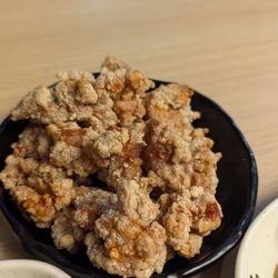 Popcorn chicken was really good. Not spicy.