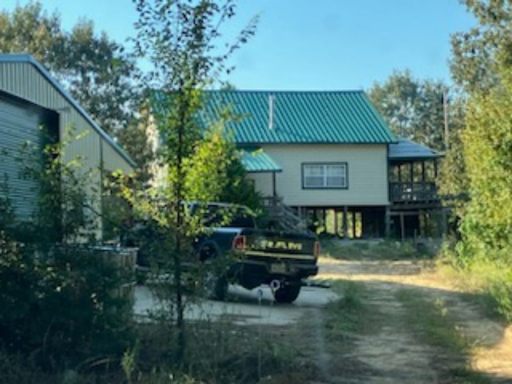 Slide of Estate Roofing