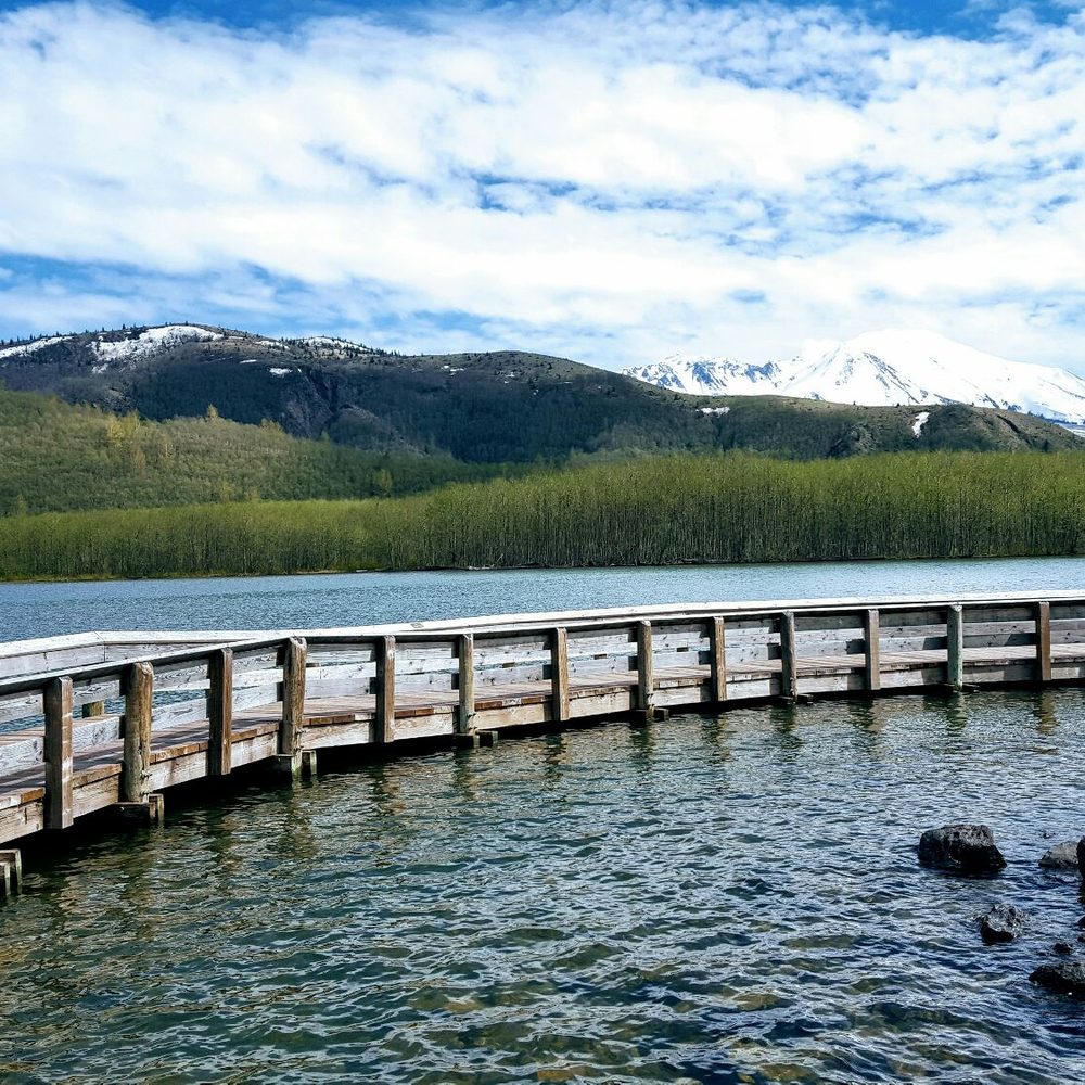 Coldwater Lake - Semi circular board walk on the lake with Mount St Helens in the distance - Lakes Near Me - Trout Lake, Washington Coldwater Lake - Semi circular board walk on the lake with Mount St Helens in the distance - Lakes Near Me - Trout Lake, Washington