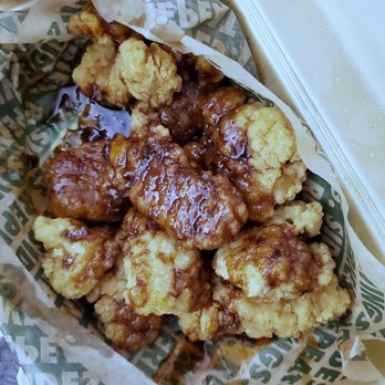 Wingstop - As you can see, most of the chicken was not covered in the sauce and if you zoom in, you can see that the breading is still moist - Chicken Wings Near Me - Clifton, New Jersey