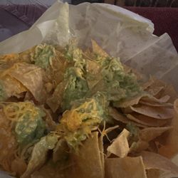 Apparently "side of chips and guac" means "nachos, hold everything but chips and guac."