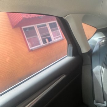 Mi Tierra - a view of a building through a car window - Mexican Near Me - Trenton, New Jersey