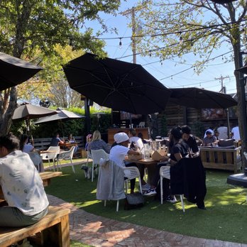 Chelsea Corner - Patio - dog friendly - not loud - artificial turf (no mud!) - American Near Me - Dallas, Texas Chelsea Corner - Patio - dog friendly - not loud - artificial turf (no mud!) - American Near Me - Dallas, Texas
