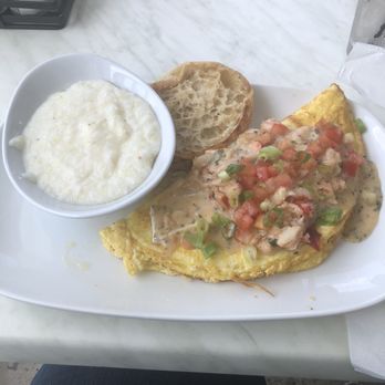 Another Broken Egg Cafe - Lobster & Brie Omelette with grits - Cafes Near Me - Atlanta, Georgia Another Broken Egg Cafe - Lobster & Brie Omelette with grits - Cafes Near Me - Atlanta, Georgia