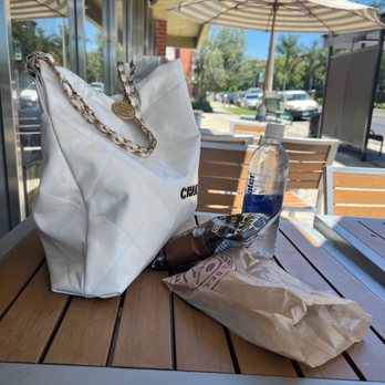 The Coffee Bean & Tea Leaf - a white bag on a table - Coffee & Tea Near Me - Los Angeles, California The Coffee Bean & Tea Leaf - a white bag on a table - Coffee & Tea Near Me - Los Angeles, California