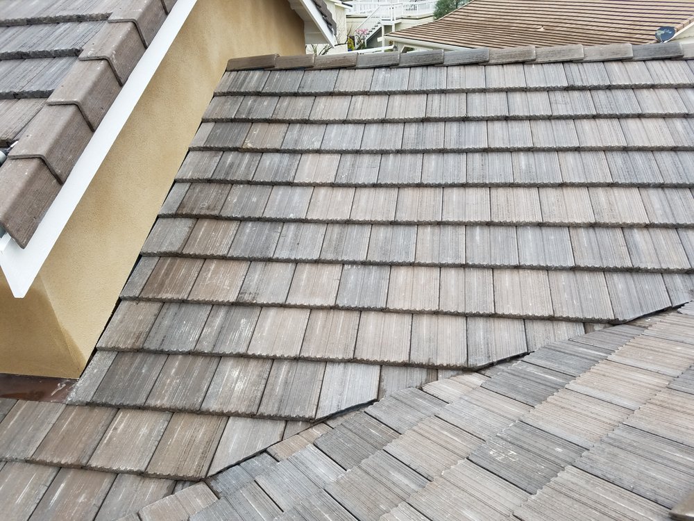 Slide of Trinity Roofing