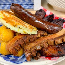 Toasty Arepas - Picada Box: Chicharron, chorizo, arepa, potatoes and plantain.