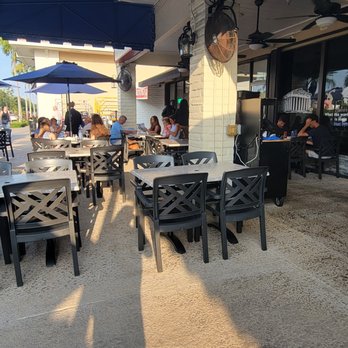 Chris' Taverna - Outdoor seating, dog friendly but remember its hot - Greek Near Me - Boynton Beach, Florida Chris' Taverna - Outdoor seating, dog friendly but remember its hot - Greek Near Me - Boynton Beach, Florida