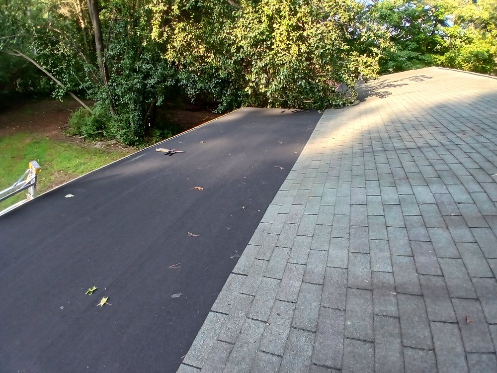 Slide of YLS Lopez Roofing Solutions