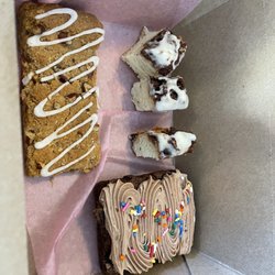 Les Petits Bisous! - Bakery yummies. Pumpkin bar, brownie & white iced crumb cake. So good.