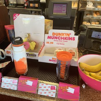 Dunkin' - a display of dunkin'donuts, bananas, and other items - Donuts Near Me - Bryant, Arkansas Dunkin' - a display of dunkin'donuts, bananas, and other items - Donuts Near Me - Bryant, Arkansas