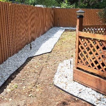 Holliday Bros Landscaping - a wooden fence and gravel path - Fences & Gates Near Me Holliday Bros Landscaping - a wooden fence and gravel path - Fences & Gates Near Me