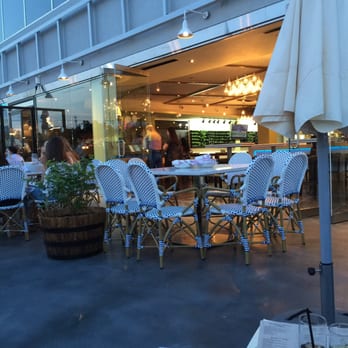 Greenhouse Kitchen + Bar - View from the couches outside! So relaxed and comfortable! - Cocktail Bars Near Me - Vienna, Virginia