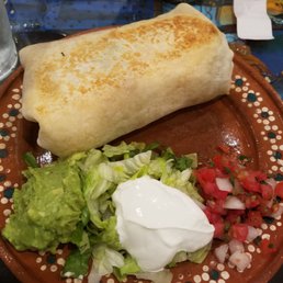 Thursday special. Steak burrito with guacamole and sour cream. Good Thursday special. Steak burrito with guacamole and sour cream. Good