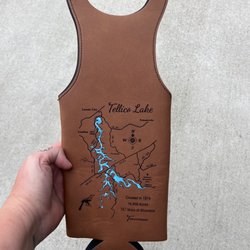Patty's Laser - Leather wine carrier with map of Tellico Lake on it