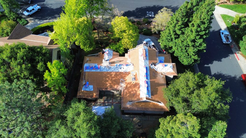 Slide of Grizzly Roofing