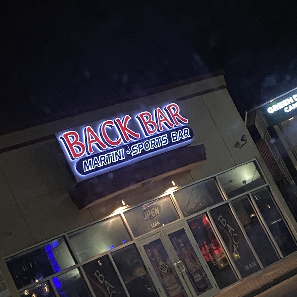 Back Bar - the front of a restaurant at night - Sports Bars Near Me - St. Petersburg, Florida