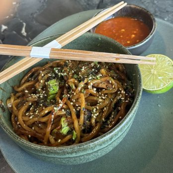 SAGO - MIE GORENG (spicy wok fried noodles, sesame ginger chicken, bok choy, Thai basil, green onion, and white sesame seeds) - Cocktail Bars Near Me - Encinitas, California