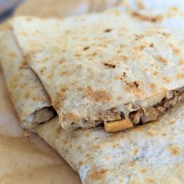 Chicken quesadilla, nice uniform thickness Chicken quesadilla, nice uniform thickness
