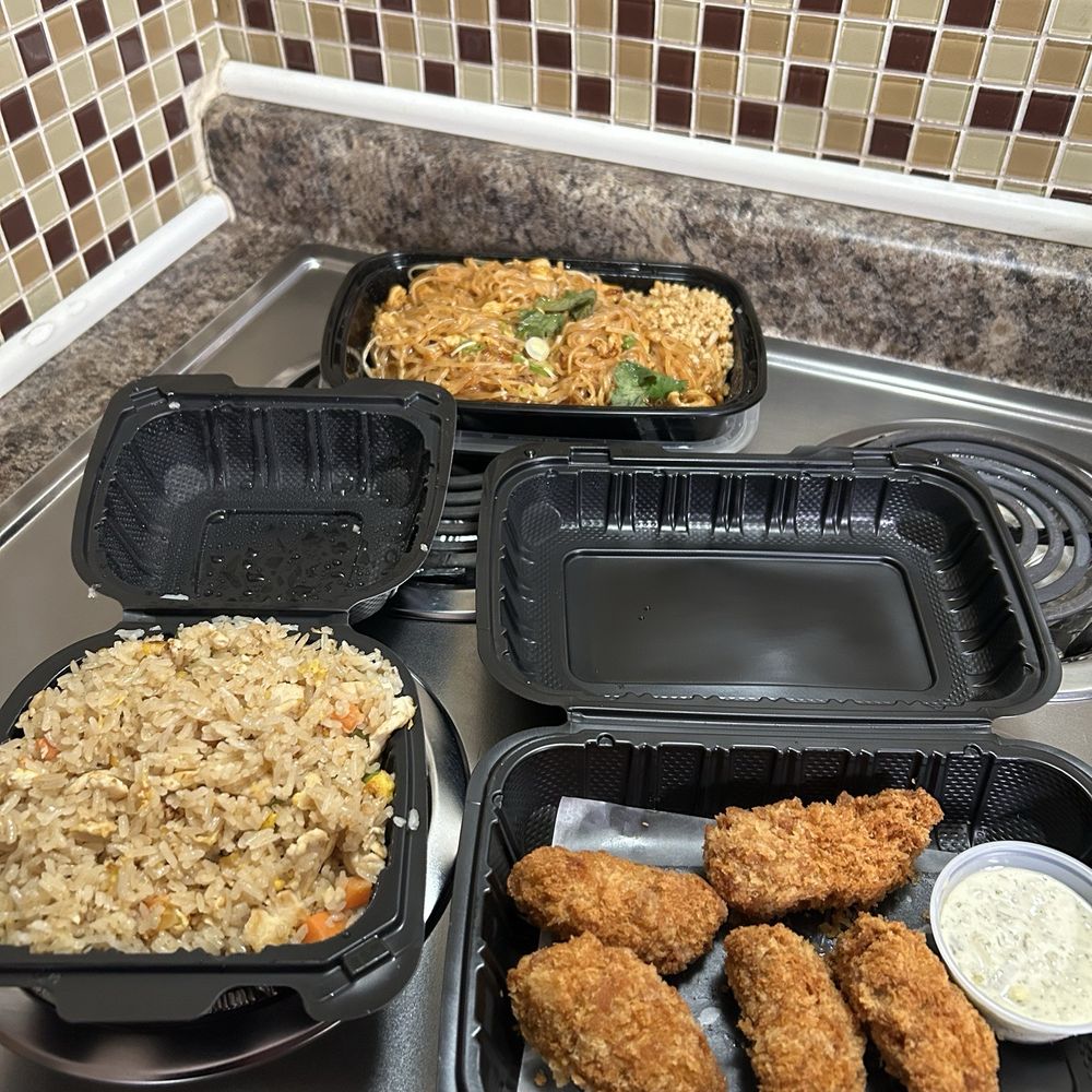 A Roi By Smiley Thai - Our to go order! Fried Oysters and GF chicken fried rice for mom and Medium spiced GF chicken Pad Thai for me!! - Thai Near Me - Nashville, Tennessee