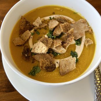 Ernie's Bar & Grill - Carrot curry spiced soup with coconut milk with fresh pita chips - American Near Me - La Quinta, California Ernie's Bar & Grill - Carrot curry spiced soup with coconut milk with fresh pita chips - American Near Me - La Quinta, California