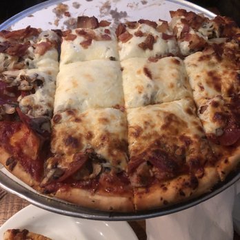 Giordano's - Our thin crusted Pizza . We created out own with pepperoni , Italian sausage , mushroom & onion with bacon .Yummo ! - Pizza Near Me - Rosemont, Illinois