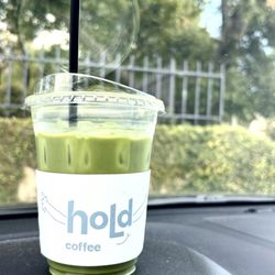 Iced matcha latte with oatmilk