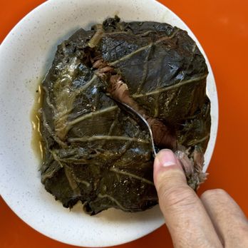 Bike Tour Hawaii - Pork cooked in some kid of leaves - Bike tours Near Me - Honolulu, Hawaii Bike Tour Hawaii - Pork cooked in some kid of leaves - Bike tours Near Me - Honolulu, Hawaii