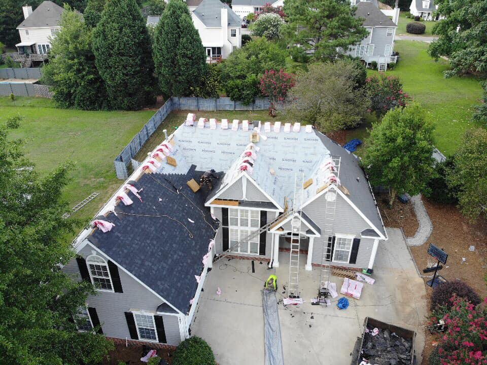 Slide of Hixon's Roofing