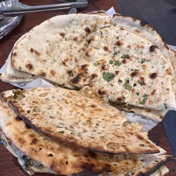 Essence Indian Cuisine - Assorted Naans - Indian Near Me - Vacaville, California Essence Indian Cuisine - Assorted Naans - Indian Near Me - Vacaville, California